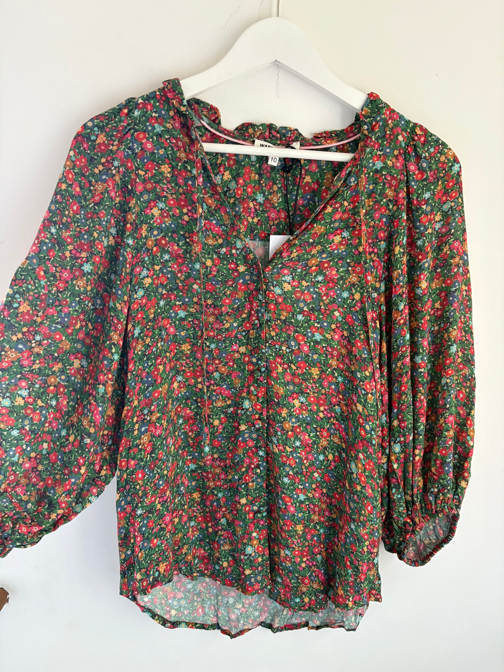 Uma blouse in garden floral size 10